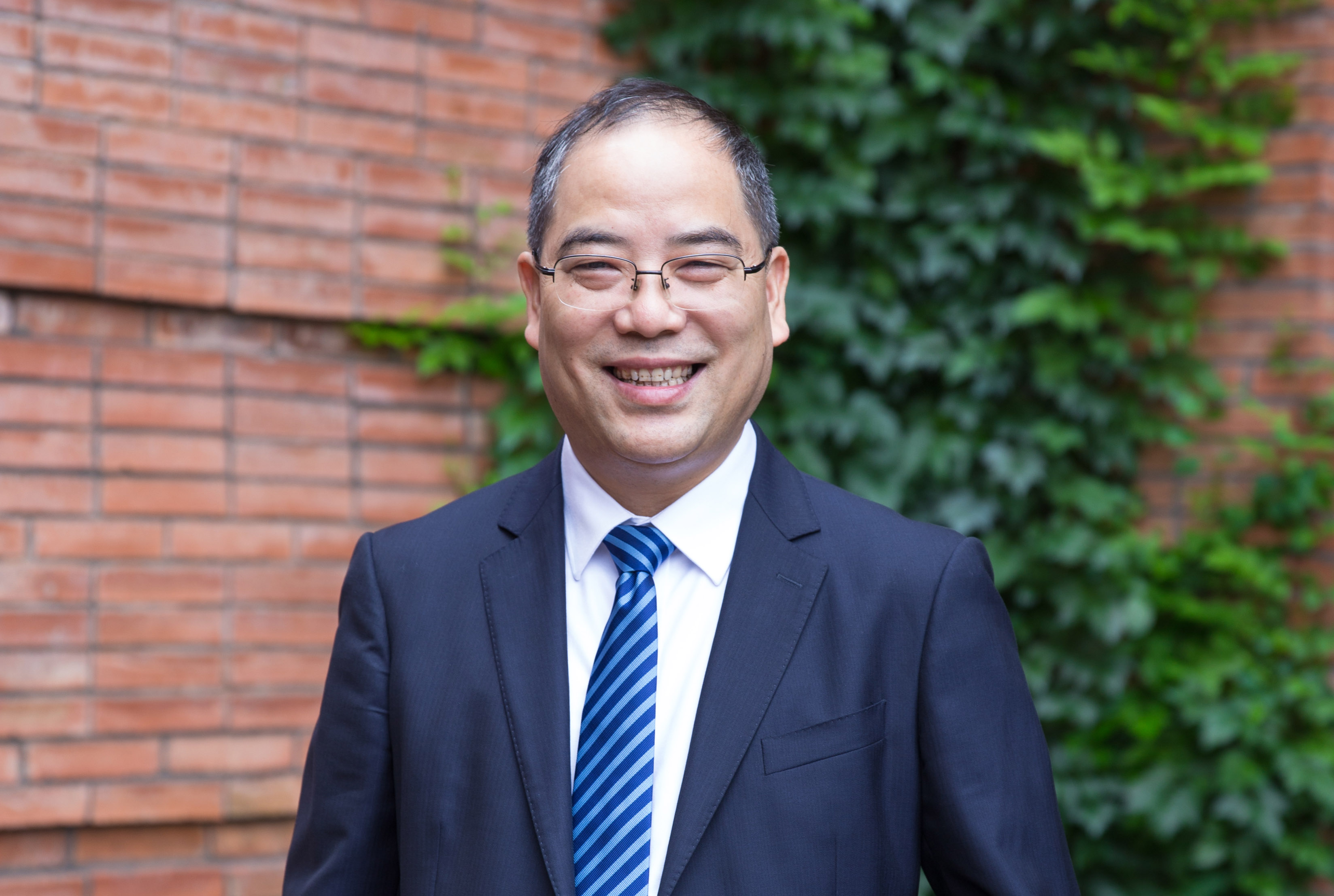 浙江工商大學黨委書記、教授 郁建興